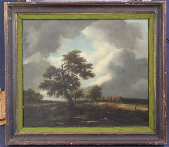 After Jacob Van Ruisdael (1628-1682) Trees in a stormy landscape, 20.5 x 24in.